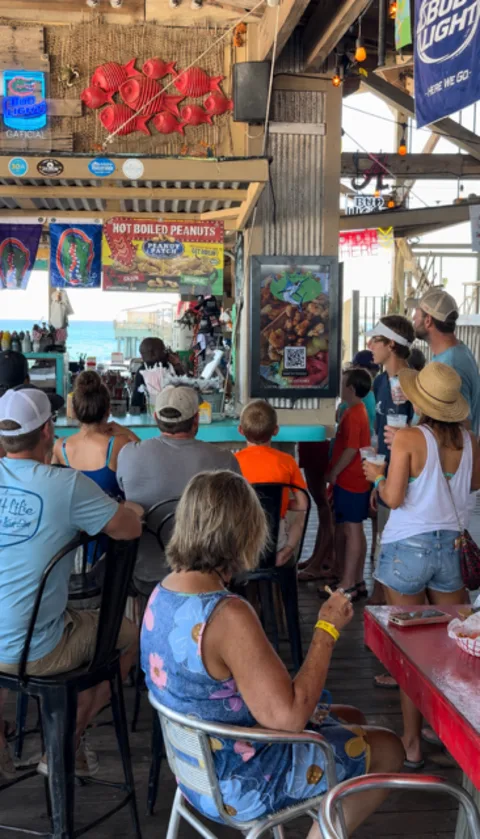 Diners beside a CDS display